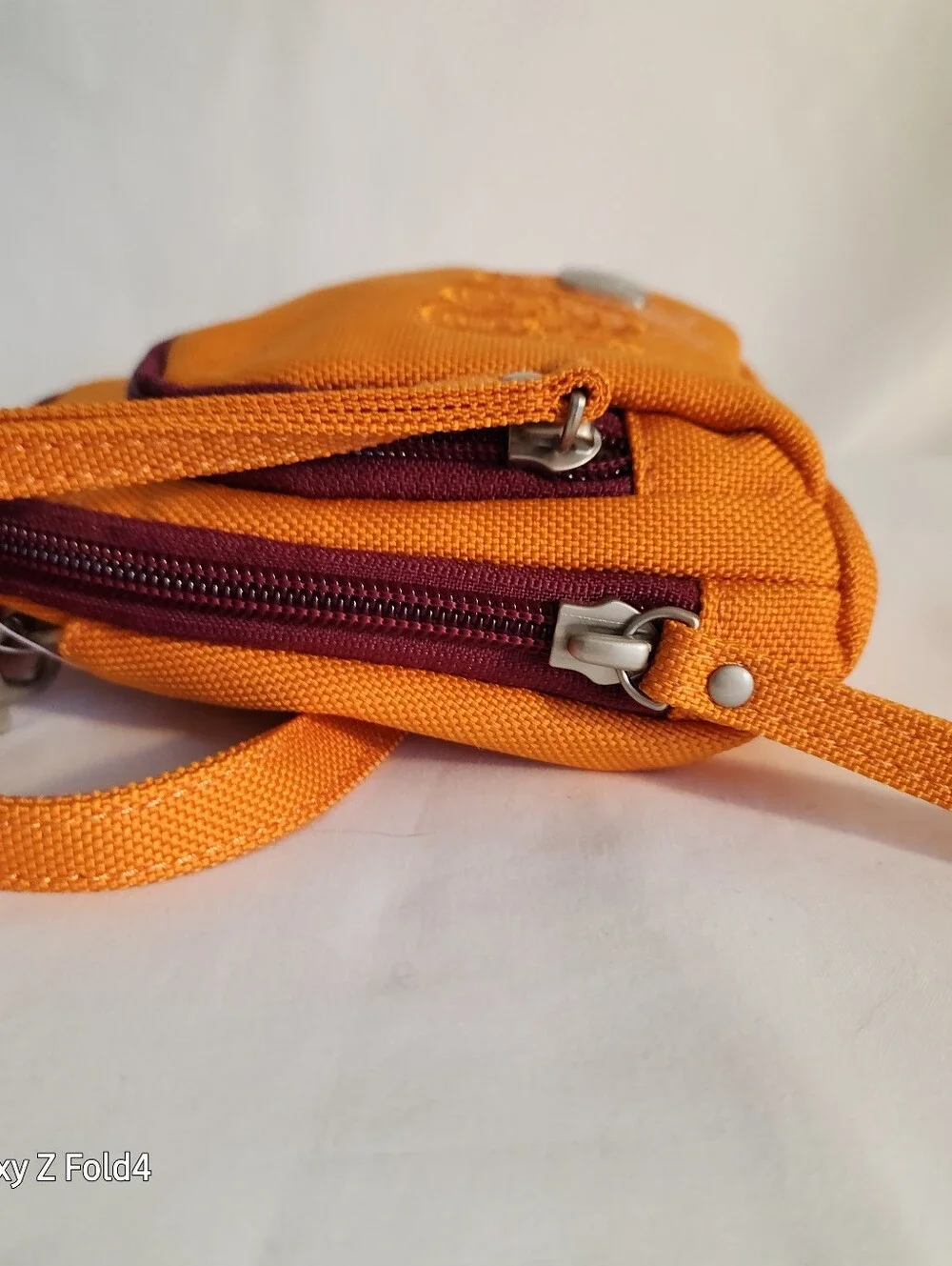 Haiku Orange Crossbody with Plum Trim and Embroidered Swirls